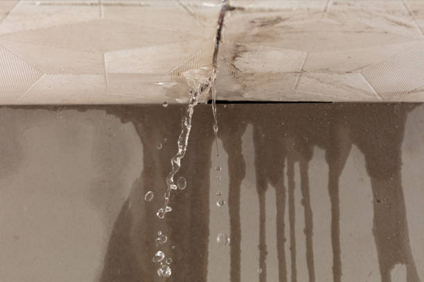 Professional Flood Damage Cleanup technician working in Belford, NJ